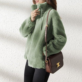 Jaqueta Puffer com Gola Alta e Pelos