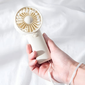 ZenWave Traveler | Miniventilador Portátil – De mão, a pilha e pronto para viagens