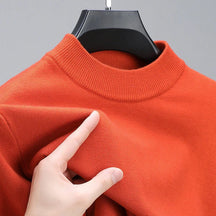 Suéter masculino de cashmere de alta qualidade com bainha elegante